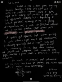 a handwritten note on a black screen
